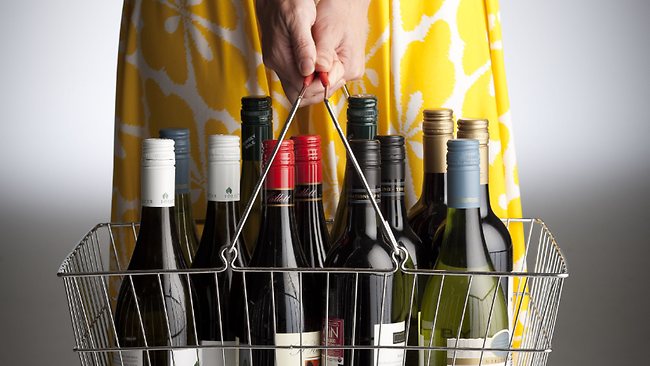 018207-shopping-basket-of-wine-bottles